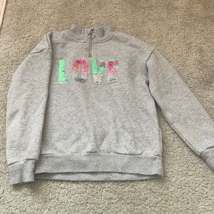 Girls sequin half zip sweater. Size 6-8Y.